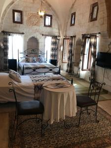 TV a/nebo společenská místnost v ubytování Kasr-i Abbas Hotel