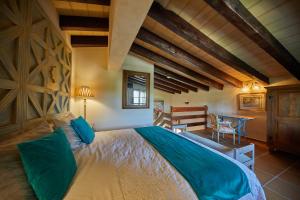 a bedroom with a large bed in a room at Agroturismo Sa Vinya des Convent in Inca +58 photos