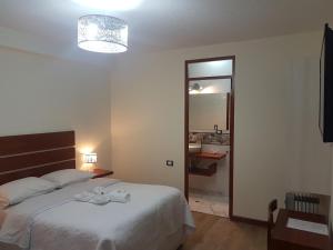 Postel nebo postele na pokoji v ubytování Hotel La Posada de Francisca