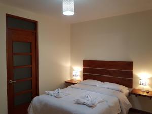 Postel nebo postele na pokoji v ubytování Hotel La Posada de Francisca