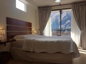 Postel nebo postele na pokoji v ubytování Hotel La Posada de Francisca