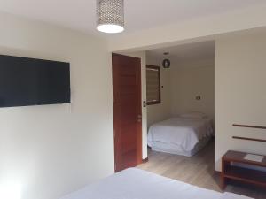 Postel nebo postele na pokoji v ubytování Hotel La Posada de Francisca