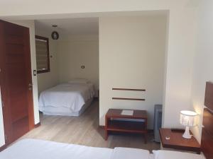 Postel nebo postele na pokoji v ubytování Hotel La Posada de Francisca