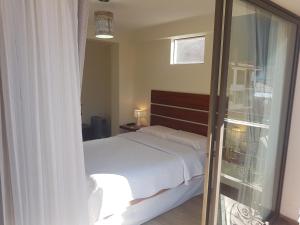 Postel nebo postele na pokoji v ubytování Hotel La Posada de Francisca