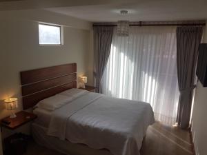 Postel nebo postele na pokoji v ubytování Hotel La Posada de Francisca