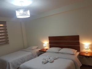 Postel nebo postele na pokoji v ubytování Hotel La Posada de Francisca