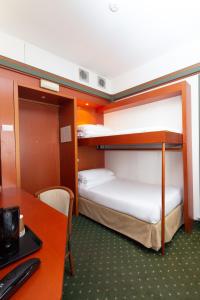 Postel nebo postele na pokoji v ubytování Jet Hotel, Sure Hotel Collection by Best Western