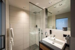 Kúpeľňa v ubytovaní Hotel Modern Mountain + 32 fotografií