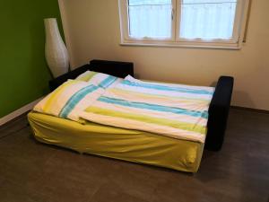 Postel nebo postele na pokoji v ubytování Ferienwohnung Pfaffenberg