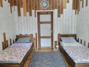 Postel nebo postele na pokoji v ubytování Отель "Swallow House"