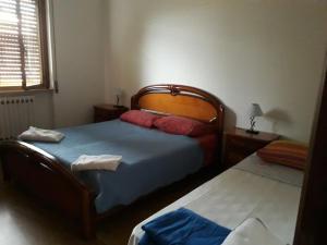 Postel nebo postele na pokoji v ubytování Casa di Ica
