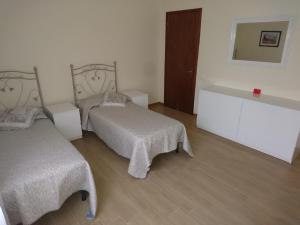 Voodi või voodid majutusasutuse Creazzo Rooms toas