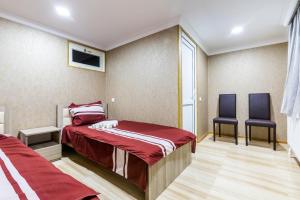 Letto o letti in una camera di The Kiwi House
