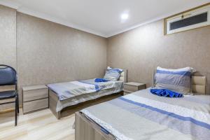 Letto o letti in una camera di The Kiwi House
