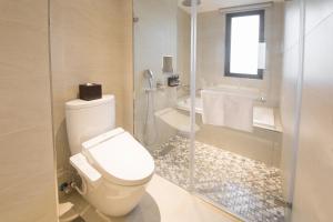 Koupelna v ubytování He-Jia Hotel