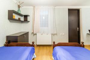 Letto o letti in una camera di The Kiwi House