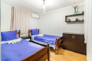 Letto o letti in una camera di The Kiwi House