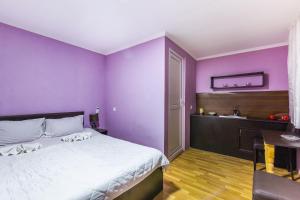 Letto o letti in una camera di The Kiwi House