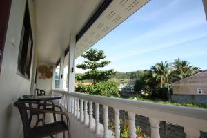 a balcony with a view of the ocean at Sun & Sea Nai Yang Phuket in Nai Yang Beach