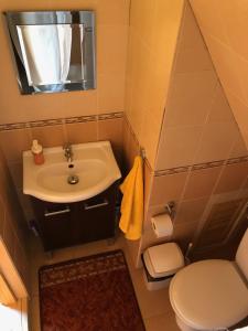 Łazienka w obiekcie Apartamenty u Krysi