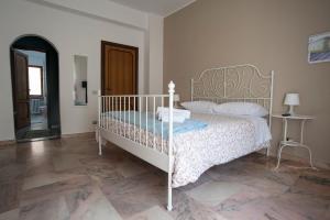 Ein Bett oder Betten in einem Zimmer der Unterkunft B&B Le Ortensie