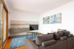 Zona d'estar a PORTOPICCOLO Luxury Penthouse