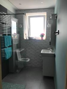 Ett badrum på Domek przy Rajskiej