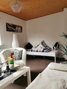 Giường trong phòng chung tại Apartments Lindenstraße