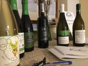 a group of wine bottles sitting on a counter at Agriturismo Crodi in Miane