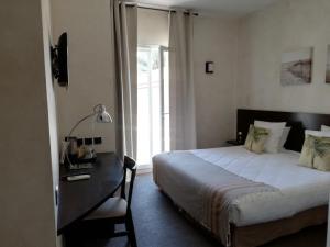 Postel nebo postele na pokoji v ubytování hôtel Le Synaya