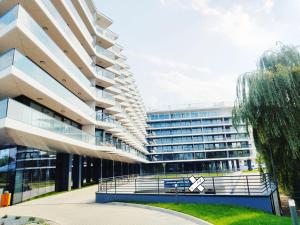 an office building with a large building at Seaside Park Private Apartment by Villmaris in Kołobrzeg