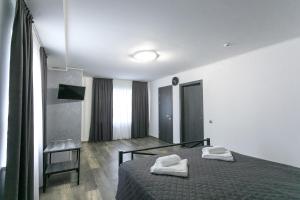 Posteľ alebo postele v izbe v ubytovaní Motel Sun Lit