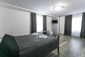 Posteľ alebo postele v izbe v ubytovaní Motel Sun Lit