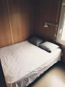 Katil atau katil-katil dalam bilik di Bjarnastaðir Guesthouse