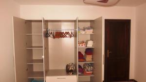 a walk in closet with a large glass door at Large apartment on golf course in San Miguel de Abona