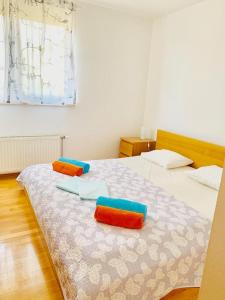 Posteľ alebo postele v izbe v ubytovaní Vila Ružica