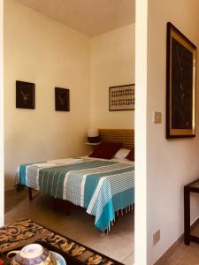 una camera con un letto di Suite China Soul EASY&COSYHOST a Roma