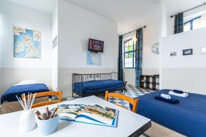 Ruang duduk di Le DOMAINE DES ECOLIERS B&B
