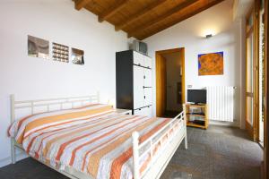 Un pat sau paturi într-o cameră la Casa Bella Terrazza