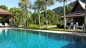 Bazén v ubytování Gardenia Oceanfront Villa nebo v jeho okolí