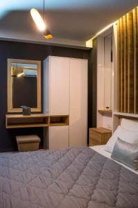 Ένα ή περισσότερα κρεβάτια σε δωμάτιο στο Apartments Stanaj