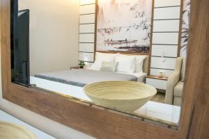 Uma cama ou camas num quarto em Apartments Stanaj