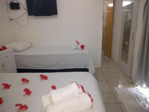 Postel nebo postele na pokoji v ubytování Casa de Samuel Lobrito