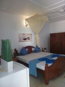 Postel nebo postele na pokoji v ubytování Embiente Guest House