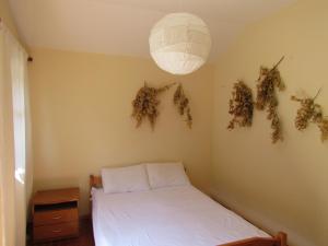 Postel nebo postele na pokoji v ubytování Hotel Germenji