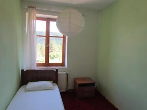 Postel nebo postele na pokoji v ubytování Hotel Germenji