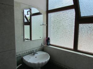 Koupelna v ubytování Hotel Germenji