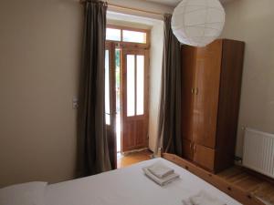 Postel nebo postele na pokoji v ubytování Hotel Germenji