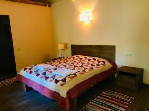 Postel nebo postele na pokoji v ubytování Sno House in Kazbeg