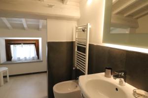 Koupelna v ubytování Borgo di Villa Cellaia Resort & SPA